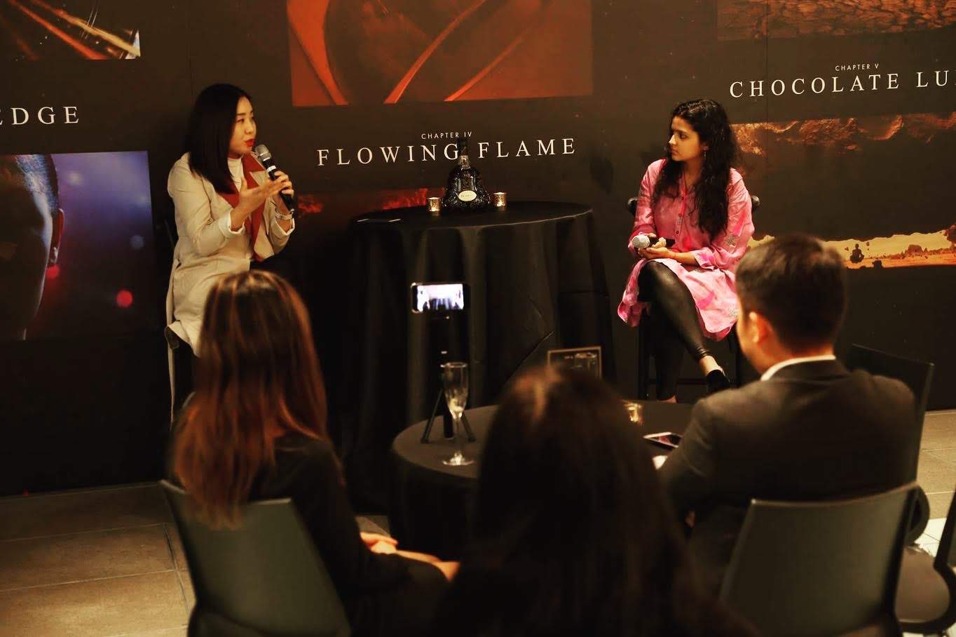 Angie Lee leading a moderated conversation