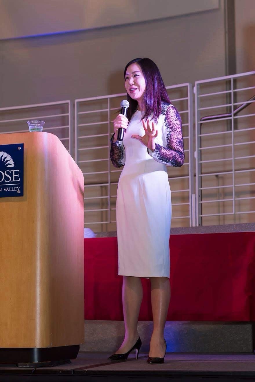 Angie Lee speaking at an international event
